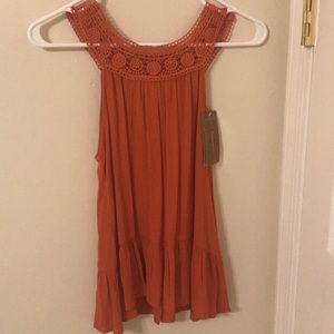 Orange flowy blouse